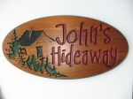 Engraved sign Johns Hideway